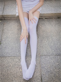Rabbit plays with painted white stockings over the knee(47)